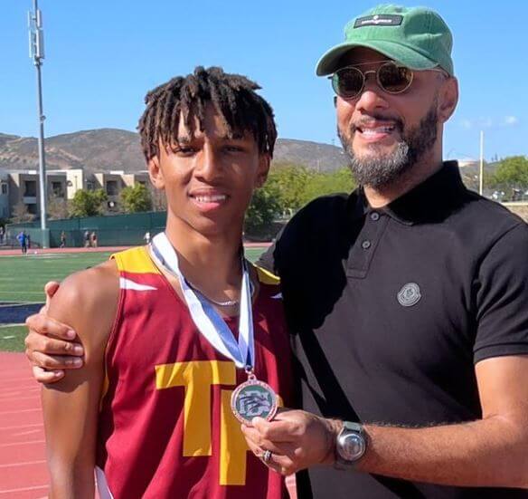 Kasseem Dean, Jr. with his father Swizz Beatz.